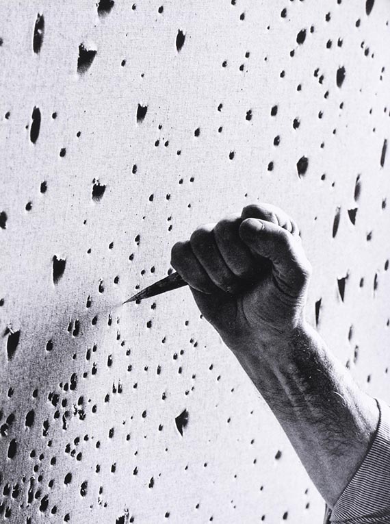 Illustration  for:  Lucio Fontana in his studio, 1966.  